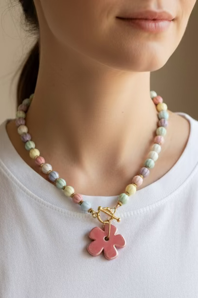 Collar bolas de cerámica con flor y acero